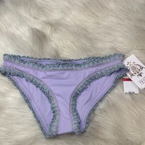 🆕 BECCA   Bottoms Hipster 
Purple with green and blue stitching !